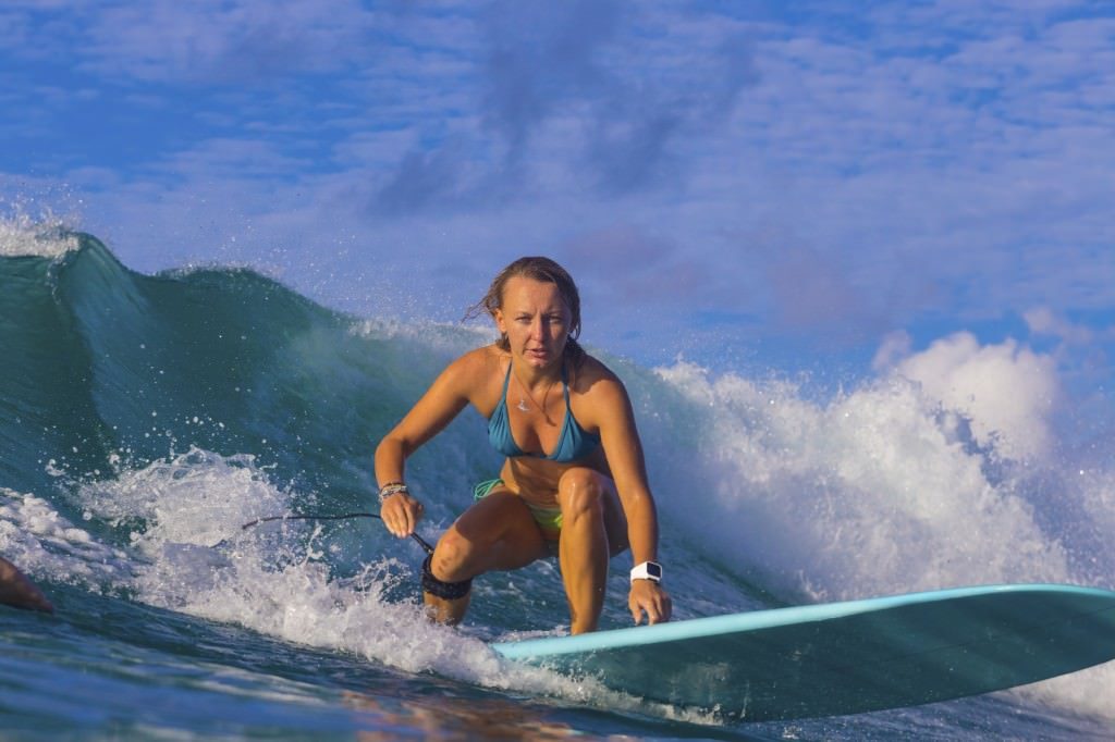 woman gone surfing in portugal