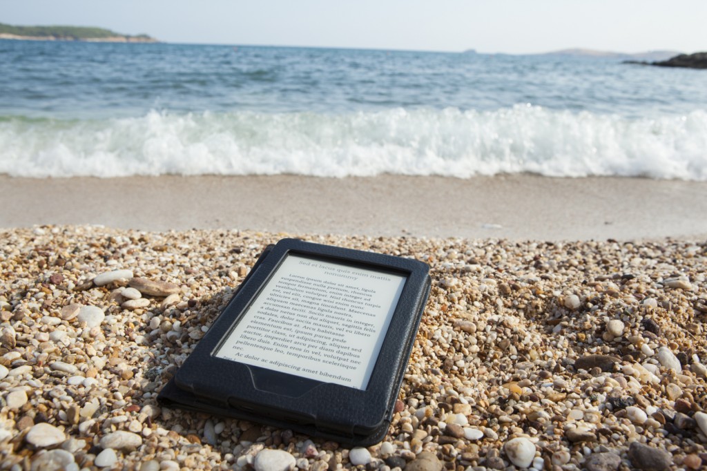 E-Reader on Beach - iStock_000045867596_Medium