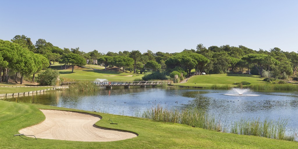 Sports golf park in Portugal. Near lake and fountain.