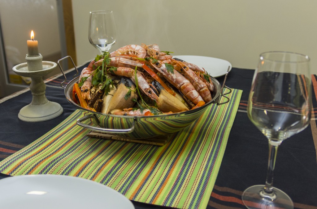 cataplana seafood served with white wine