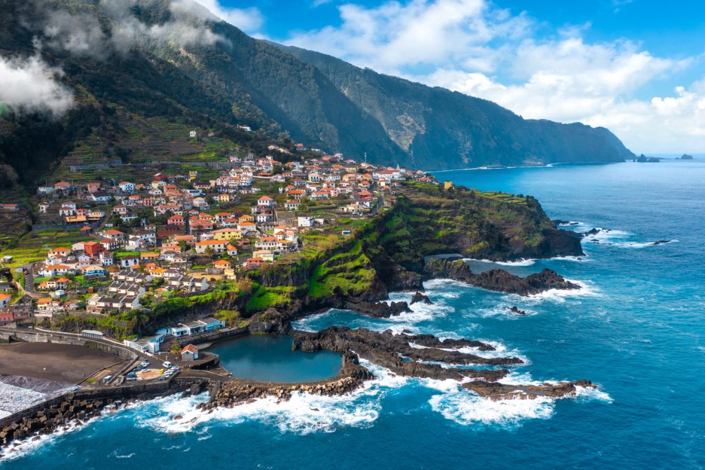 Aerial view of Madeira island. Land meets ocean in Seixal, Madeira, Portugal