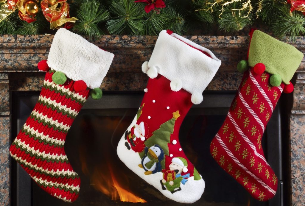 Christmas stocking on fireplace background